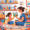 Orthophoniste montrant un livre illustré à une petite fille dans une salle pleine de jeux éducatifs
